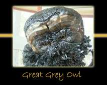 great grey owl steel sculpture by canadian sculptor hilary clark cole